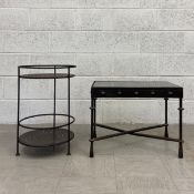 A 20th century continental style side table having a rectangular glass top set into a cast iron
