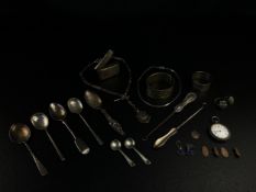 A miscellaneous collection of twenty three hallmarked silver items. L.50.5cm (fob chain). Weight:
