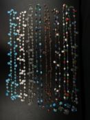 A collection of eight vintage French cut glass teardrop necklaces with three pairs of matching