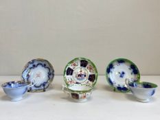 Three 19th century porcelain cups and saucers to include Gaudy Welsh meadow sweet pattern, Burma