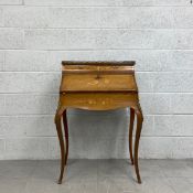 A 19th century rosewood and marquetry inlaid bureau de dame with fall front revealing a fitted