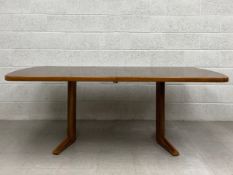 A mid century Danish style Marlow Range extending rosewood dining table by Martin Hall for Gordon