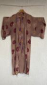 An early to mid 20th century Chinese silk paofu robe or gown having an all-over stylised