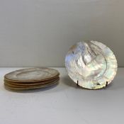 A set of six hand carved mother of pearl dishes. W.16cm