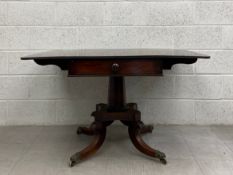 A 19th century mahogany Pembroke sofa table having a rectangular top with two drop leaves over a