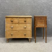 A Victorian pine chest of two short over two long drawers raised on arrow supports along with an