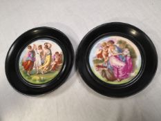 Two 19th century style wall hanging porcelain plates with printed decoration, one depicting the