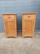 A pair of Victorian style pine bedside cabinets each having a square top over a single frieze drawer