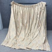 A pair of hessian backed pale peach and white pleated damask curtains. L.240 W.170cm