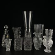 A mixed collection of cut glass a lead crystal to include three decanters with stoppers, six vases