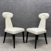A pair of contemporary Vera dining chairs by Jonathan Adler each having a shaped and tapered off