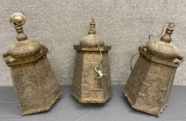 Three 19th century pierced, engraved and cold painted brass, copper and white metal North African