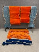 A collection of thirteen mixed hessian backed velvet and tasselled curtain pelmets. L.500 W.56cm.