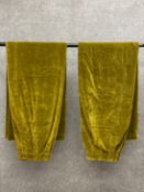 A pair of green velvet pleated curtains. L.260 W.100cm (Each curtain)