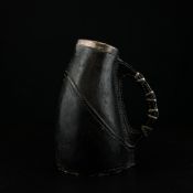 An early 20th century silver mounted Blackjack by Royal Doulton Lambeth having a hallmarked silver