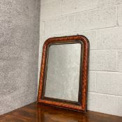 A 19th century simulated burr walnut overmantel mirror having an arched frame and plate. H.83 W.62cm