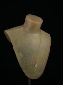 A 20th century hallmarked 9ct gold necklace with a pearl grape and vine motif in a thin open