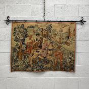 A medieval style wall hanging needlework tapestry with linen lining, a hunting scene on a cast