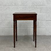A Georgian mahogany occasional or lamp table having a rectangular crossbanded top over a single
