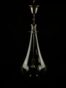 A contemporary pendant light having a powder coated metal fixing and narrow stem with light