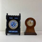 An Aesthetic movement mantle clock having blue and white brass mounted enamelled dial surrounded