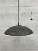 A large 20th century hemispherical hammered metal ceiling light with a faux bronze finish