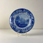 A 19th century blue and white pearlware plate by Poutney & Goldney, transfer printed with a
