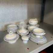 An early 20th century child's miniature part dinner service to include a tureen, a serving bowl on