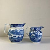 Two early 19th century blue and white pearlware jugs possibly by Copeland Spode each having a