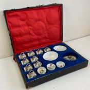 A Japanese Meiji period part tea service comprising nine cups and two plates along with six hand