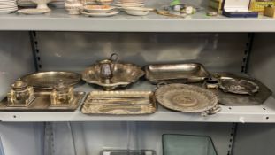 A miscellaneous collection of silver plated items to include a desktop inkwell, tureens, trays