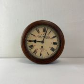 A 20th century British Railways Southern Region oak wall clock having a hand painted 12