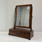 A 19th century mahogany toilet mirror fitted with base drawer on shaped ogee bracket feet. H.60cm