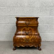 A contemporary Dutch style walnut marquetry inlaid chest of drawers of bombe form having a thumb