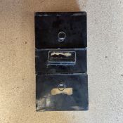 A 20th century metal box with a mixed collection of coins. L.27.5cm