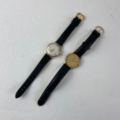 A vintage 14k gold wristwatch with seventeen jewels along with a Montine International quartz