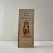 A 20th century anatomical book titled 'Philips' Model of the Human Body (Female)' illustrated and
