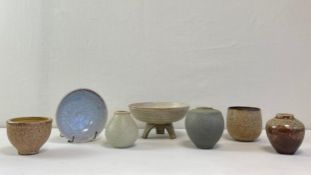 A collection of salt-glazed studio pottery to include three vases, two teacups and two dishes with