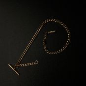 A gold graduated Albert chain with t-bar and fob, marked 9ct and 375 to each curb link. L.43cm