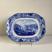 An early 19th century blue and white lead glazed earthenware meat platter by Poutney & Allies,