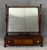 A 19th century mahogany swing frame toilet mirror. H.65 W.60 D.23cm