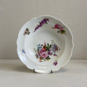 A rare early 19th century lobed porcelain Nantgarw dish hand painted by or under the influence of