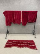A set of seven hessian backed burgundy velvet pleated curtains with a matching pelmet. L.130 W.