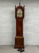 A George III mahogany longcase clock by John Beard London having three brass ball eagle spire