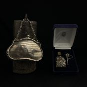 A 1916 hallmarked silver purse by Henry Matthews along with a 1998 hallmarked .925 silver repousse