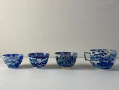 Four early 19th century blue and white pearlware cups transfer printed with figural hunting and