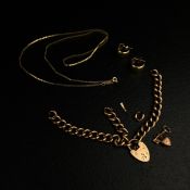 A mixed collection of 9ct gold to include a hallmarked box chain, a heart lock curb link bracelet, a