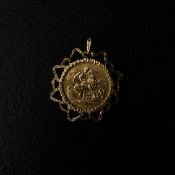A 22ct gold full Edward VII sovereign C.1910 in a 9ct gold openwork pendant surround. L.4cm Weight: