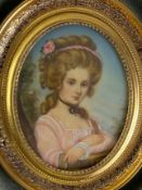 A 19th century style miniature portrait painting of a lady in and oval gilt frame. H.17 W.15cm
