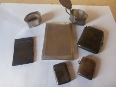 A mixed collection of silver to include a notebook and pencil, two vesta cases, two cigarette cases,